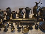 many different types of silverware on a table