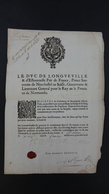 un gros plan d'un morceau de papier sur lequel on a écrit