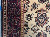 an image of a close up of a rug on a table