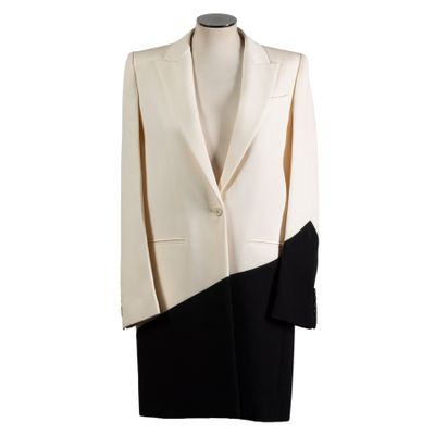 the coat is black and white and has a black and white color block