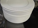 several plates stacked on top of each other on a kitchen counter