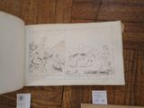 a picture of a book on a table with a drawing on it