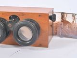 a picture of a pair of binoculars sitting on a table