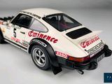 a toy car that is sitting on a white surface