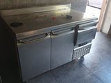 an image of a kitchen with a stainless steel counter top