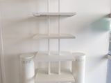 a white shelf with a sign that says keune on it