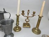 a lot of candles that are sitting on a table