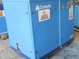 a blue machine that is sitting in a room