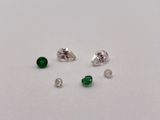 four different types of diamonds on a white surface