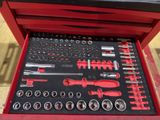 the tools are in the red case on the table