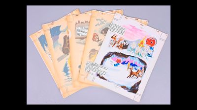 plusieurs feuilles de papier sont empilées les unes sur les autres sur une table