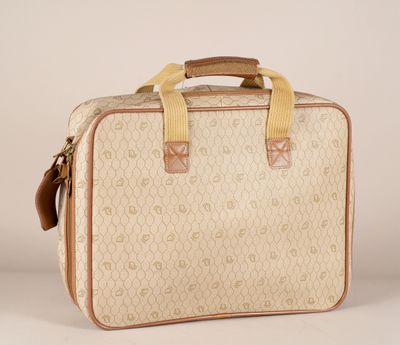 an image of a beige and tan suitcase with a handle