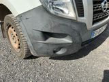 a close up of a truck with mud on the front of it