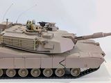 a model of a tank sitting on a white surface