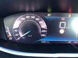 a close up of a car ' s dashboard with a speedometer