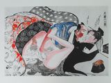 a drawing of a woman laying on a bed