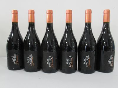 six bottles of wine are lined up in a row