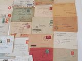 many different types of letters and envelopes laid out on a table