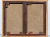 a close up of a picture of a wooden frame on a wall