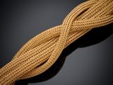 a close up of a rope on a black surface