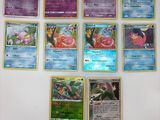 beaucoup de cartes pokemon sur le mur
