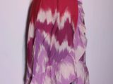 pink and purple tie dye skirt on a mannequin dummy