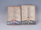 two boxes of dobonnet cigarettes sitting on top of a table