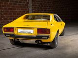 a yellow car that is parked in a garage