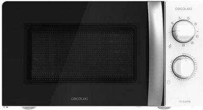 une image d'un four à micro-ondes sur fond blanc