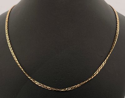 Chaine en or jaune 750 millièmes à maille cubaine.