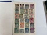 a book with a lot of different stamps on it