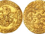 a gold coin with an image of a man on a horse