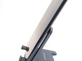 a cell phone that is sitting on a stand