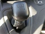 a close up of a car ' s gear lever in the center console