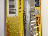 a package of scissors on a table with a barcode on it