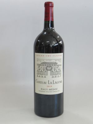 a bottle of wine that is sitting on a table