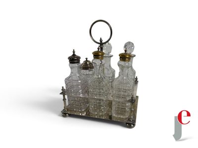a silver and glass bottle set with a keychain