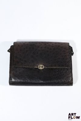 Sac en cuir d'autruche noir, 4 soufflets, anse bandoulière.