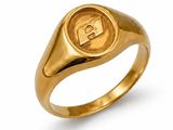 a close up of a gold ring with a letter on it