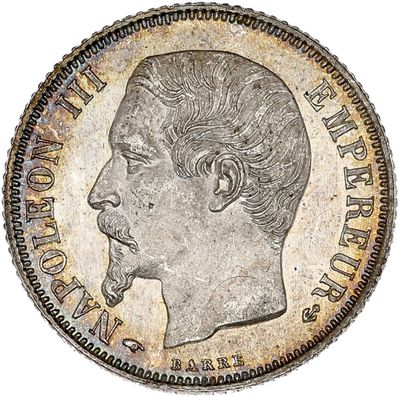 a close up of a coin with a man ' s face on it