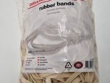 a bag of rubber bands sitting on a table