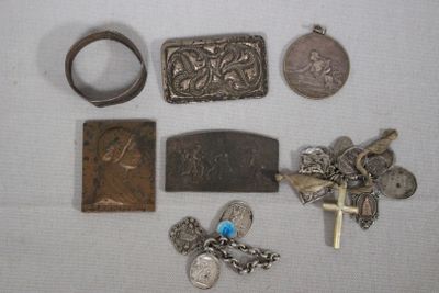 a lot of silver items that are on a table