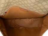 the inside of a tan purse with a zipper on it