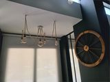 a chandelier hanging from the ceiling in a room