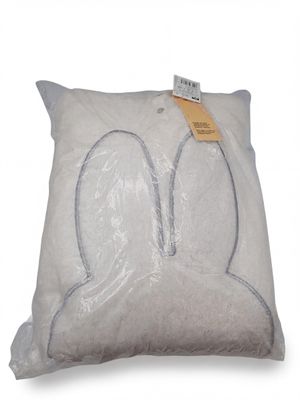 the pillow is made of plastic and has a bunny head on it