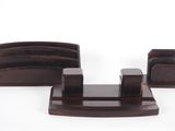 a set of three wooden desk accessories on a white background