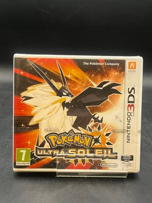 un gros plan sur un boîtier de jeu Nintendo sur lequel figure un jeu Pokémon