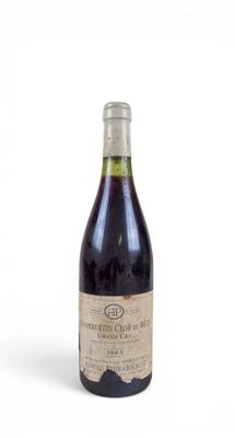 a bottle of wine that is sitting on a table