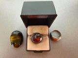 a ring in a box with a ring in it and two other rings