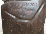 a metal canister with a metal lid on it
